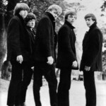 Tages
Tidig arkivbild och fan foto. Skepparjackor och spetsiga boots